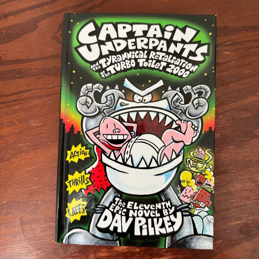 2 Captain Underpants hardcover books by Dav Pilkey. Tyrannical Revolting Revenge